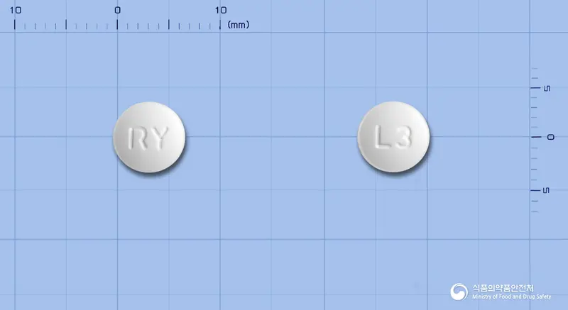 오마스트정(리마프로스트알파덱스) 앞뒤 사진 (흰색 원형, 각인 RY / L3)