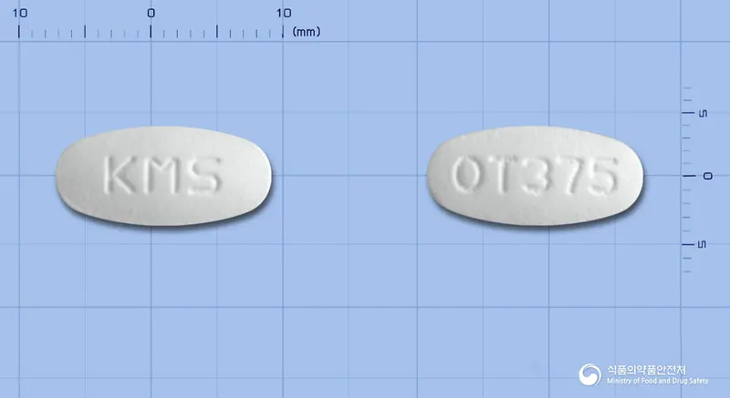 오구멘탐정375mg 앞뒤 사진 (흰색 타원형, 각인 KMS / OT375)