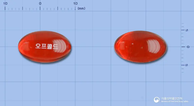 오프콜드연질캡슐(수출용) 앞뒤 사진 (빨간색·투명 캡슐, 각인 오프콜드)