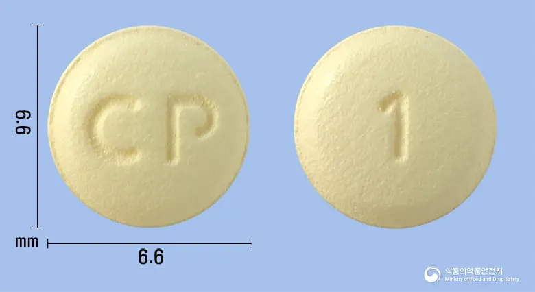 씨엠케어정5mg(솔리페나신숙신산염) 앞뒤 사진 (노란색 원형, 각인 CP / 1)