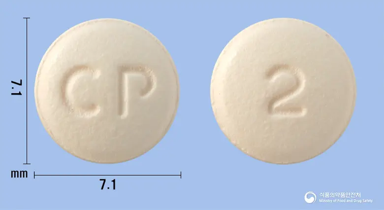 씨엠케어정10mg(솔리페나신숙신산염) 앞뒤 사진 (분홍색 원형, 각인 CP / 2)