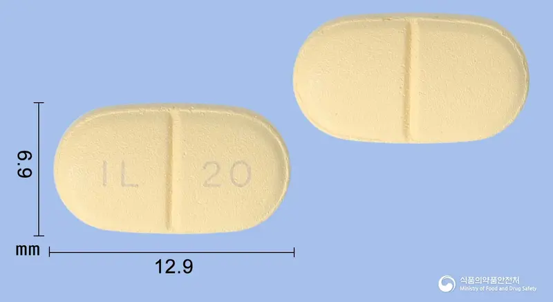 일라정20mg(타다라필) 앞뒤 사진 (주황색 타원형, 각인 IL 20)