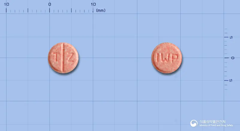 테로핀정2밀리그램(테라조신염산염수화물) 앞뒤 사진 (분홍색 원형, 각인 T Z / IWP)