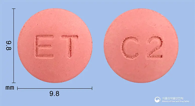 크로바정200mg (건조레드클로버엑스) 앞뒤 사진 (분홍색 원형, 각인 ET / C2)
