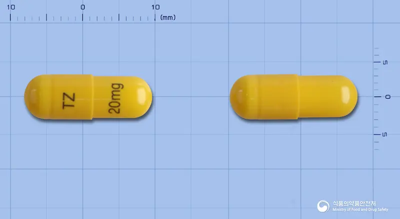 테모람캡슐20밀리그램(테모졸로미드) 앞뒤 사진 (주황색 캡슐, 각인 TZ20mg)