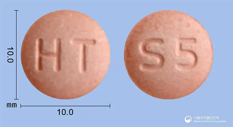 싱귤다운츄정5mg(몬테루카스트나트륨) 앞뒤 사진 (분홍색 원형, 각인 HT / S5)