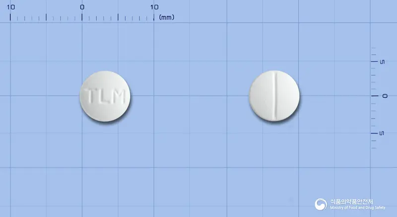 타리민정(베포타스틴니코틴산염) 앞뒤 사진 (흰색 원형, 각인 TLM)