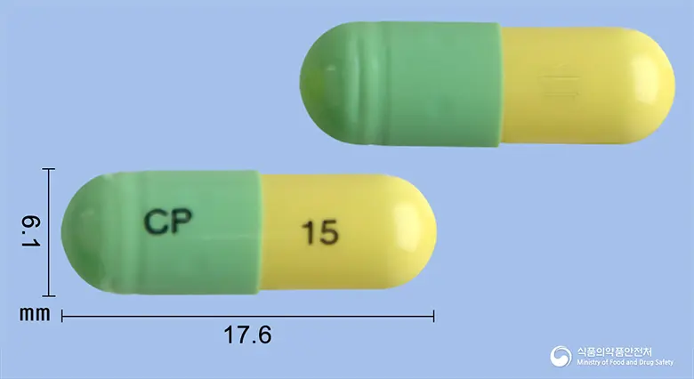 씨엠지멜록시캄캡슐15mg 앞뒤 사진 (연두색 캡슐, 각인 CP 15)