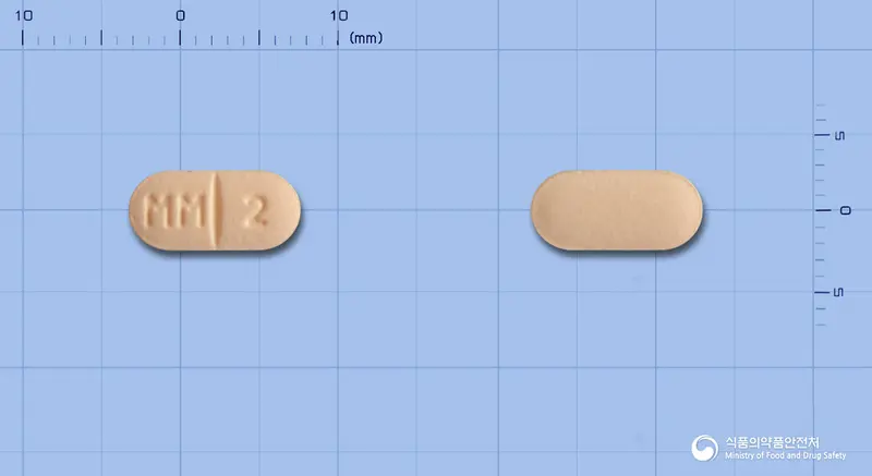 명문리스페리돈정2mg 앞뒤 사진 (주황색 장방형, 각인 MM 2)