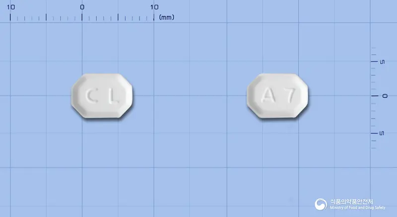 크라노스정5밀리그램(암로디핀베실산염) 앞뒤 사진 (흰색 팔각형, 각인 CL / A7)