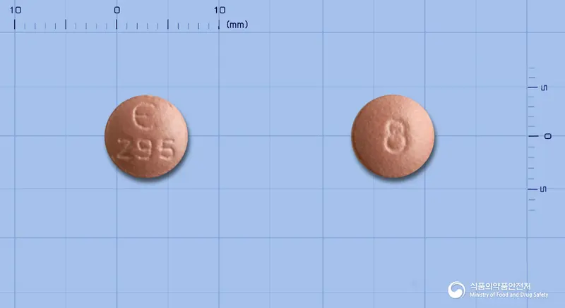 파이콤파필름코팅정8밀리그램(페람파넬) 앞뒤 사진 (분홍색 원형, 각인 295 / 8)