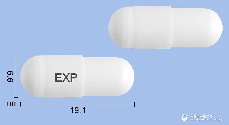 익스펜캡슐 앞뒤 사진 (흰색 캡슐, 각인 EXP)