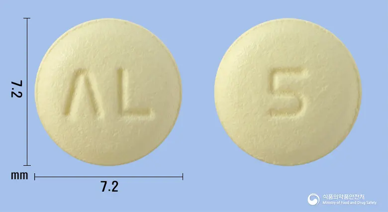 솔페락정5mg(솔리페나신숙신산염) 앞뒤 사진 (노란색 원형, 각인 ΛL / 5)