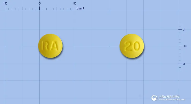 라베탑정20mg(라베프라졸나트륨) 앞뒤 사진 (노란색 원형, 각인 RA / 20)