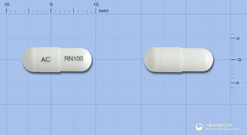 가바로닌캡슐100mg(가바펜틴) 앞뒤 사진 (흰색 캡슐, 각인 AC RN100)
