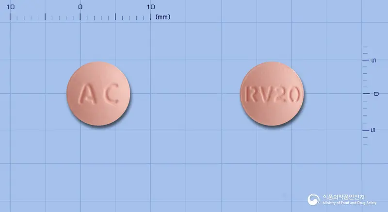 크레스정20mg(로수바스타틴칼슘) 앞뒤 사진 (분홍색 원형, 각인 AC / RV20)