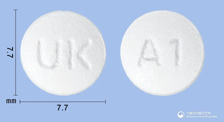 아토르반정20mg(아토르바스타틴칼슘삼수화물) 앞뒤 사진 (흰색 원형, 각인 UK / A1)