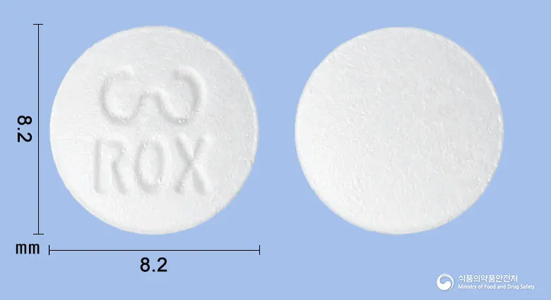 록시론정150mg(록시트로마이신) 앞뒤 사진 (흰색 원형, 각인 ROX)