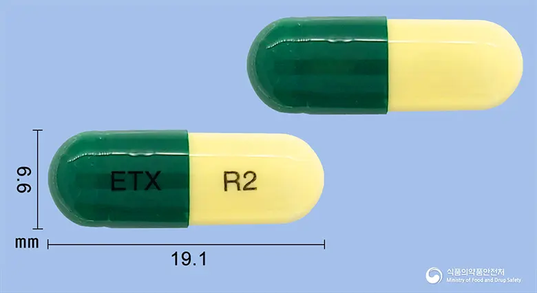 엘다인캡슐(에르도스테인) 앞뒤 사진 (초록색 캡슐, 각인 ETX R2)