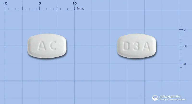 알렌드본플러스디정 앞뒤 사진 (흰색 타원형, 각인 AC / D3A)