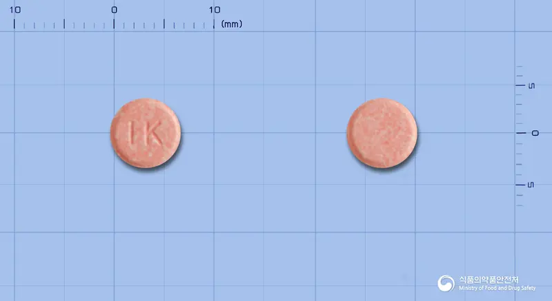 테라포스정2밀리그램(테라조신염산염수화물) 앞뒤 사진 (분홍색 원형, 각인 IK)