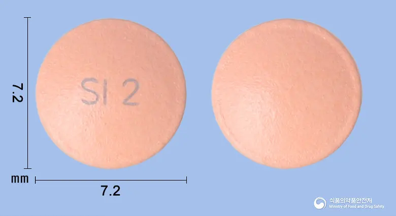 신에소메정20mg(에스오메프라졸마그네슘삼수화물) 앞뒤 사진 (분홍색 원형, 각인 SI 2)