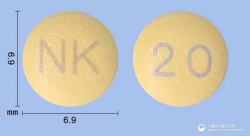 라베민정20mg(라베프라졸나트륨) 앞뒤 사진 (주황색 원형, 각인 NK / 20)