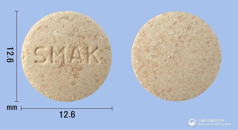 함소아생맥산정(단미엑스혼합제) 앞뒤 사진 (분홍색 원형, 각인 SMAK)