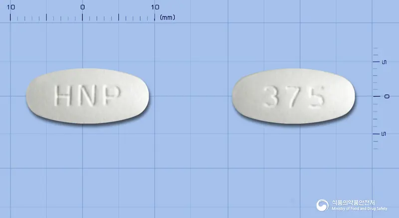 아시크라정375mg(아목시실린수화물·클라불란산칼륨(2:1)) 앞뒤 사진 (흰색 타원형, 각인 HNP / 375)