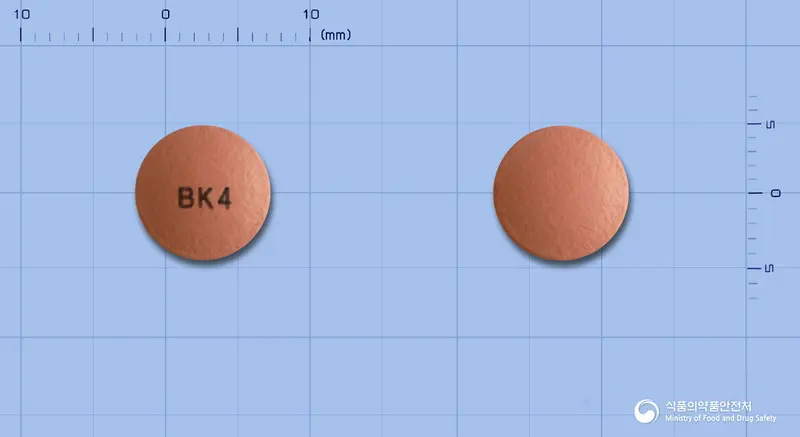 부소메졸정40mg(에스오메프라졸마그네슘삼수화물) 앞뒤 사진 (분홍색 원형, 각인 BK4)