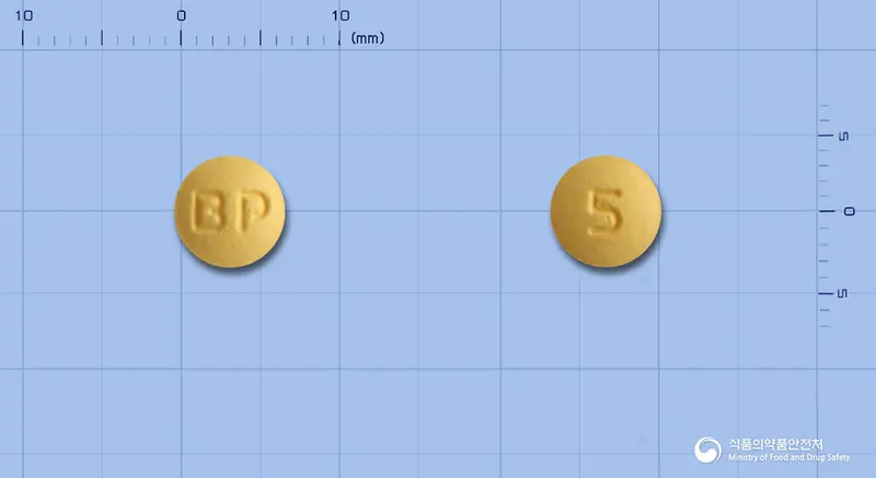 크로바틴정5mg(로수바스타틴칼슘) 앞뒤 사진 (주황색 원형, 각인 BP / 5)
