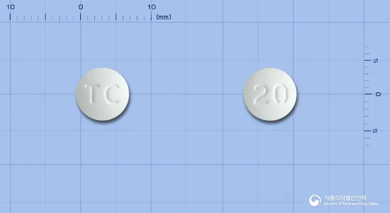 아로틴정20mg(아토르바스타틴칼슘삼수화물) 앞뒤 사진 (흰색 원형, 각인 TC / 20)