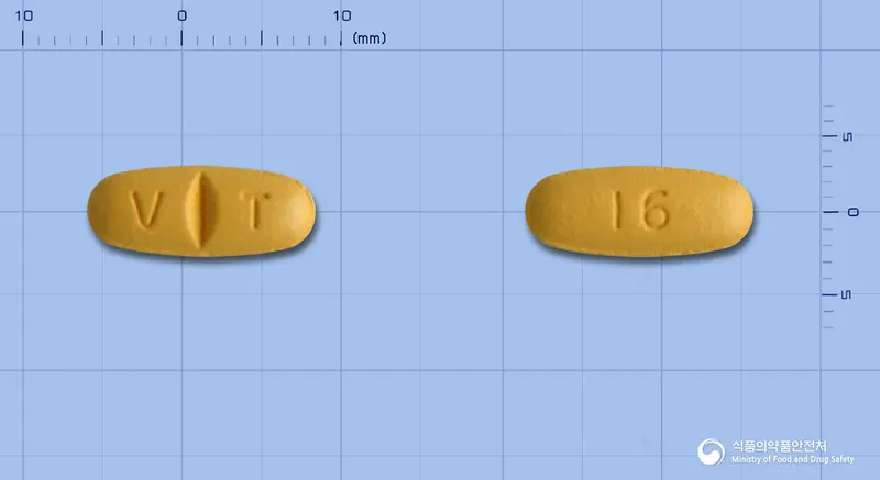 바레탄정160mg(발사르탄) 앞뒤 사진 (주황색 타원형, 각인 V T / 16)