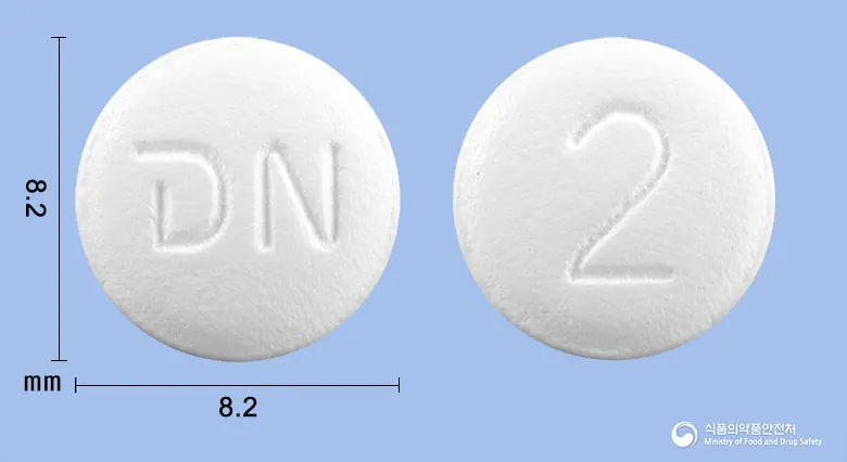 뉴메살탄정20mg(올메사탄메독소밀) 앞뒤 사진 (흰색 원형, 각인 N / 2)