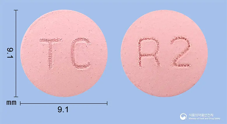 로바이드정20mg(로수바스타틴칼슘) 앞뒤 사진 (분홍색 원형, 각인 TC / R2)