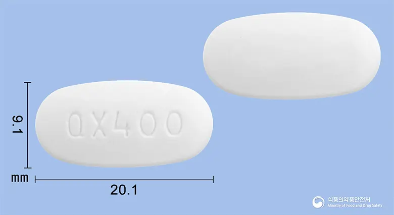 쿠에타핀서방정400밀리그램(쿠에티아핀푸마르산염) 앞뒤 사진 (흰색 타원형, 각인 QX400)