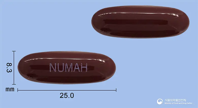 뉴먼트마하연질캡슐 앞뒤 사진 (갈색 캡슐, 각인 NUMAH)