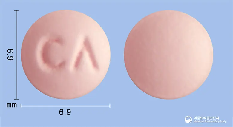 자니큐정75mg(라니티딘염산염) 앞뒤 사진 (분홍색 원형, 각인 CΛ)