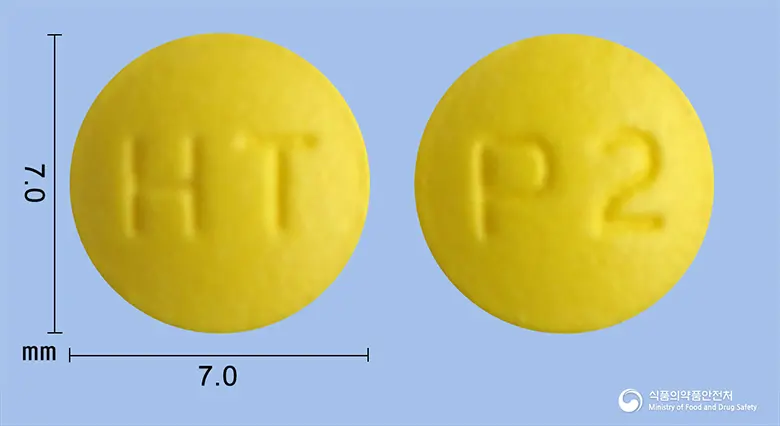 파리나졸정20mg(라베프라졸나트륨) 앞뒤 사진 (노란색 원형, 각인 HT / P2)