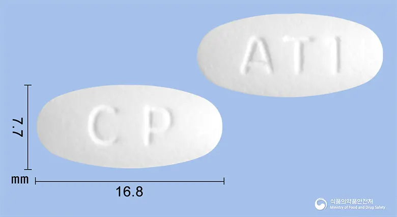 아크렌틴정375mg(아목시실린-클라불란산칼륨(2:1)) 앞뒤 사진 (흰색 타원형, 각인 CP / AT1)