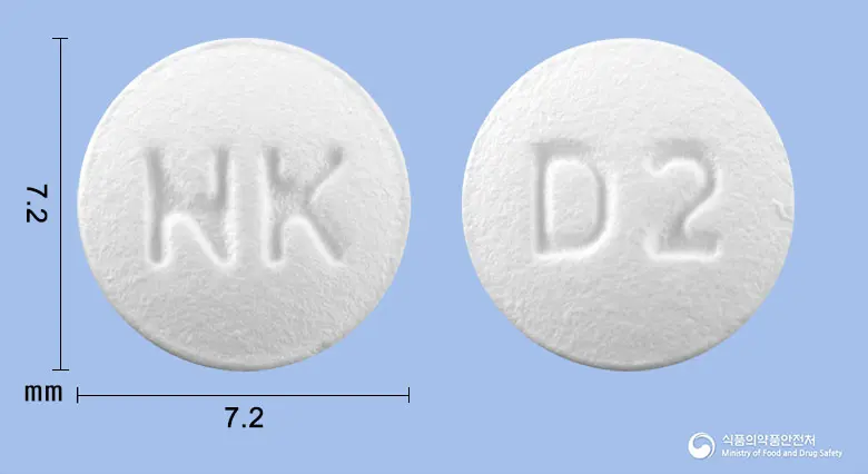 도네핀정5mg(도네페질염산염수화물) 앞뒤 사진 (흰색 원형, 각인 NK / D2)