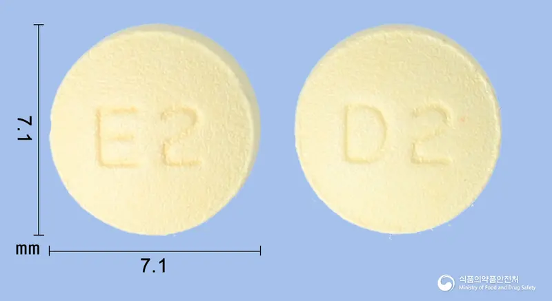 알로페질정5mg(도네페질염산염수화물) 앞뒤 사진 (노란색 원형, 각인 E2 / D2)