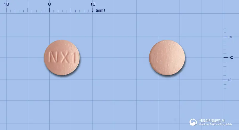 넥스프라졸정20mg(에스오메프라졸마그네슘이수화물) 앞뒤 사진 (분홍색 원형, 각인 NX1)