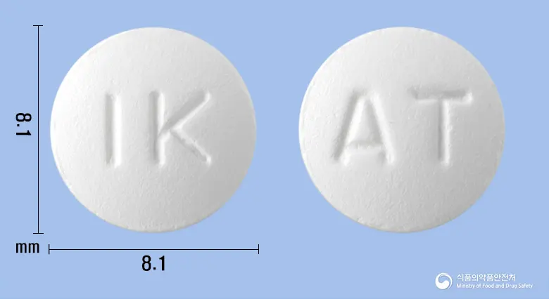 올테놀정50mg(아테놀롤) 앞뒤 사진 (흰색 원형, 각인 IK / AT)