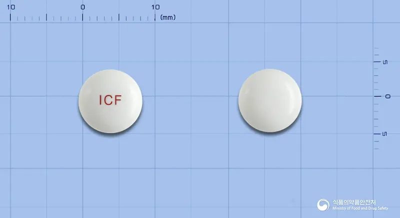 파모딘정(파모티딘) 앞뒤 사진 (흰색 원형, 각인 ICF)