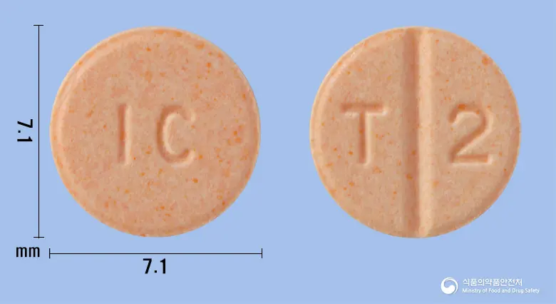 테라산정2mg(테라조신염산염수화물) 앞뒤 사진 (분홍색 원형, 각인 IC / T 2)