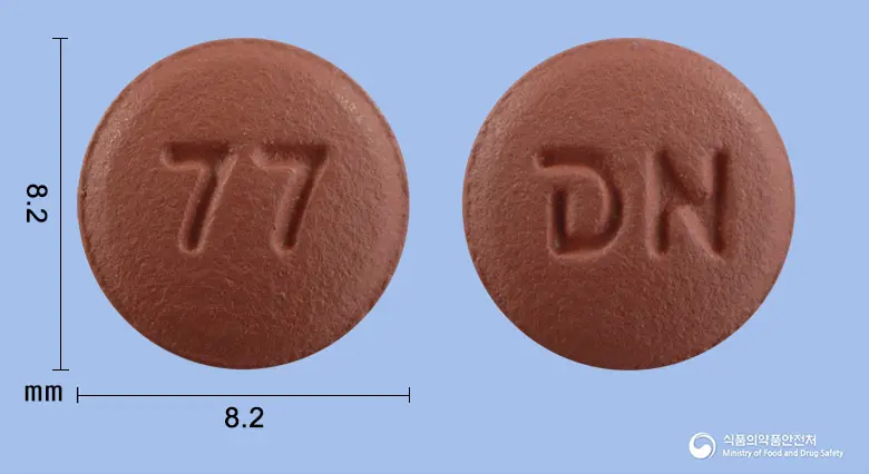 뉴비카정10/40mg 앞뒤 사진 (빨간색 원형, 각인 77 / N)