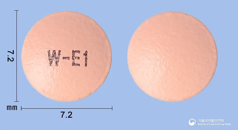 넥세라정20밀리그램(에스오메프라졸마그네슘삼수화물) 앞뒤 사진 (분홍색 원형, 각인 W-E1)