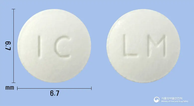 리파몬정(리마프로스트알파덱스) 앞뒤 사진 (흰색 원형, 각인 IC / LM)