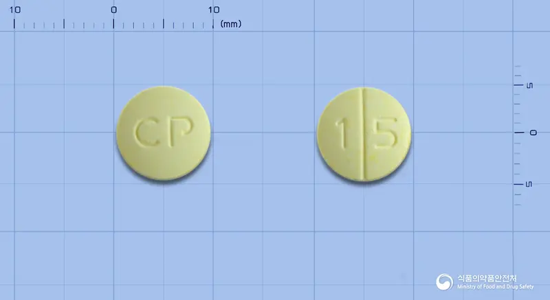 아세드린정 앞뒤 사진 (노란색 원형, 각인 CP / 1 5)